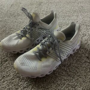On Running White/Grey and Yellow Athletic Shoes